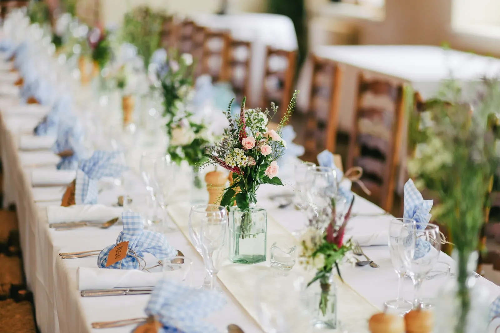 Reception tables set for a warm, lingering dinner
